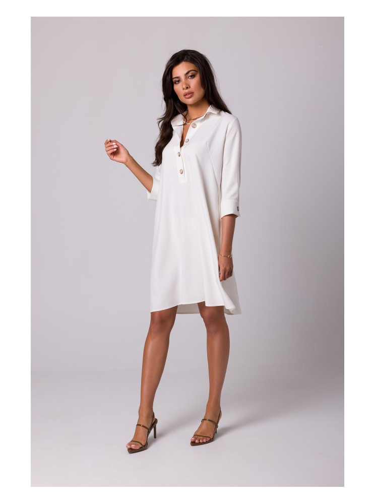 B257 Plazdančio silueto marškininė suknelė - kreminė